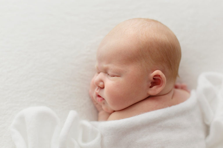side of baby's face
