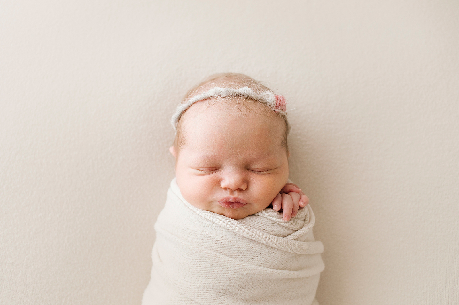 baby wrapped in a cream blanket-newborn-photographer-geelong